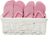 baby pink flip flops in a basket